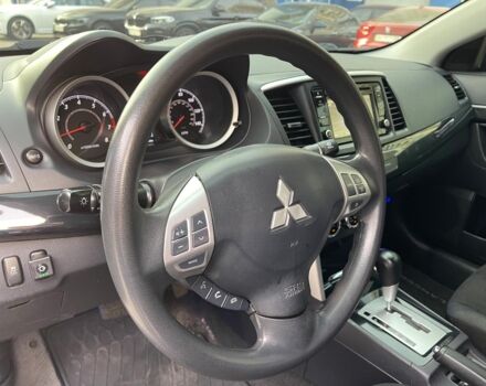 Синій Міцубісі Lancer, об'ємом двигуна 2 л та пробігом 180 тис. км за 9290 $, фото 26 на Automoto.ua