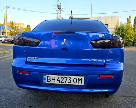 Синий Мицубиси Лансер, объемом двигателя 2 л и пробегом 190 тыс. км за 9999 $, фото 2 на Automoto.ua
