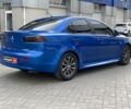 Синій Міцубісі Lancer, об'ємом двигуна 2 л та пробігом 180 тис. км за 9290 $, фото 4 на Automoto.ua