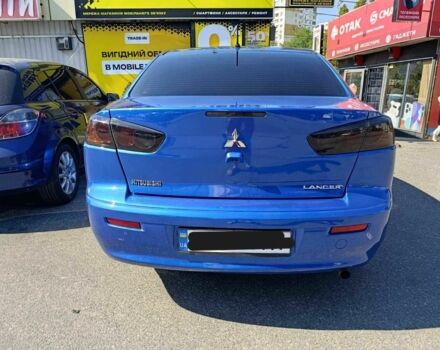 Синий Мицубиси Лансер, объемом двигателя 2 л и пробегом 130 тыс. км за 7800 $, фото 3 на Automoto.ua