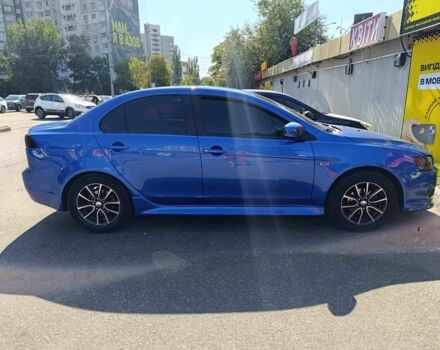 Синий Мицубиси Лансер, объемом двигателя 2 л и пробегом 130 тыс. км за 7800 $, фото 5 на Automoto.ua