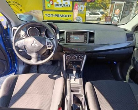 Синий Мицубиси Лансер, объемом двигателя 2 л и пробегом 130 тыс. км за 7800 $, фото 9 на Automoto.ua