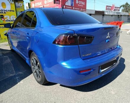Синий Мицубиси Лансер, объемом двигателя 2 л и пробегом 130 тыс. км за 7800 $, фото 2 на Automoto.ua