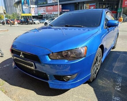 Синий Мицубиси Лансер, объемом двигателя 2 л и пробегом 130 тыс. км за 7800 $, фото 5 на Automoto.ua