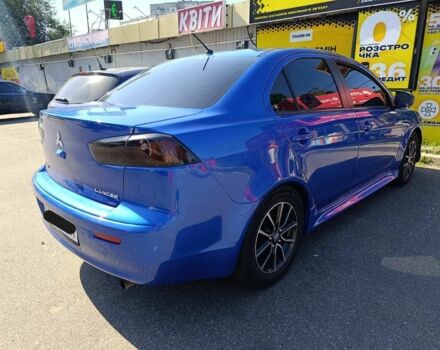 Синий Мицубиси Лансер, объемом двигателя 2 л и пробегом 130 тыс. км за 7800 $, фото 1 на Automoto.ua