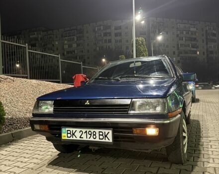 Синий Мицубиси Лансер, объемом двигателя 1.5 л и пробегом 170 тыс. км за 650 $, фото 12 на Automoto.ua
