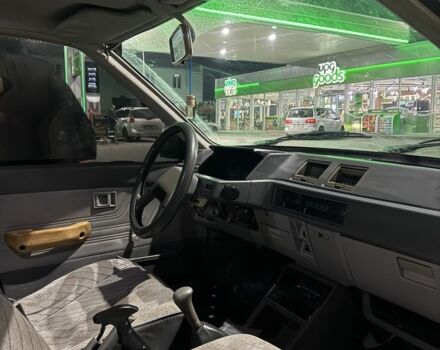 Синий Мицубиси Лансер, объемом двигателя 1.5 л и пробегом 170 тыс. км за 650 $, фото 3 на Automoto.ua