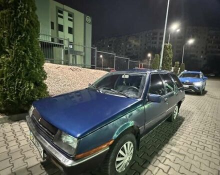 Синий Мицубиси Лансер, объемом двигателя 1.5 л и пробегом 170 тыс. км за 650 $, фото 10 на Automoto.ua