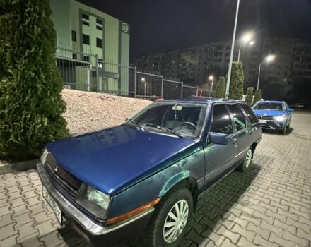 Синий Мицубиси Лансер, объемом двигателя 1.5 л и пробегом 170 тыс. км за 650 $, фото 10 на Automoto.ua