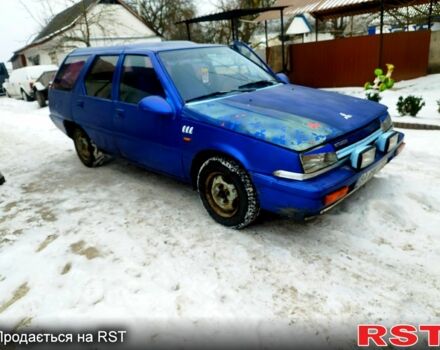 Синій Міцубісі Lancer, об'ємом двигуна 1.5 л та пробігом 235 тис. км за 550 $, фото 1 на Automoto.ua