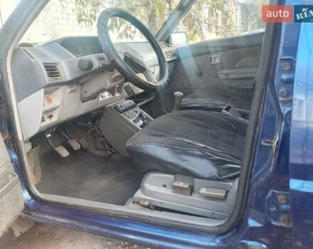 Синий Мицубиси Лансер, объемом двигателя 0 л и пробегом 322 тыс. км за 650 $, фото 2 на Automoto.ua