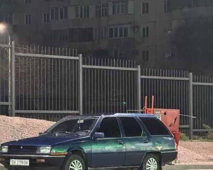 Синий Мицубиси Лансер, объемом двигателя 1.5 л и пробегом 170 тыс. км за 650 $, фото 11 на Automoto.ua