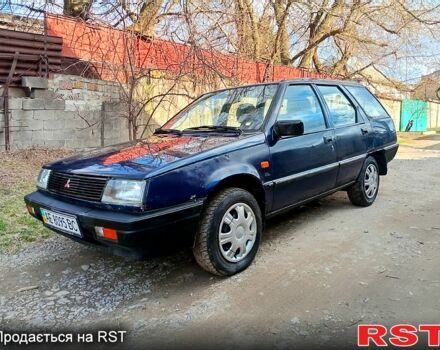 Синий Мицубиси Лансер, объемом двигателя 1.5 л и пробегом 150 тыс. км за 1000 $, фото 1 на Automoto.ua