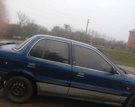 Синій Міцубісі Lancer, об'ємом двигуна 1.6 л та пробігом 3 тис. км за 500 $, фото 4 на Automoto.ua