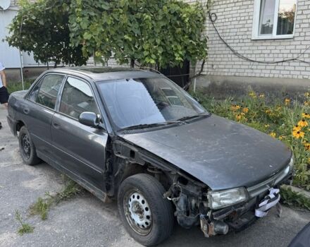 Синий Мицубиси Лансер, объемом двигателя 1.6 л и пробегом 999 тыс. км за 594 $, фото 2 на Automoto.ua