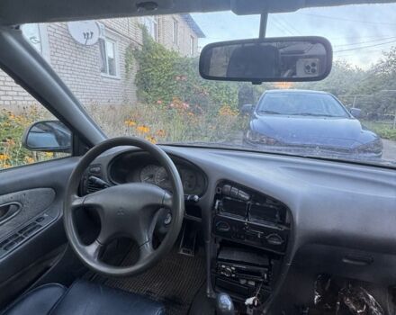 Синий Мицубиси Лансер, объемом двигателя 1.6 л и пробегом 999 тыс. км за 594 $, фото 8 на Automoto.ua