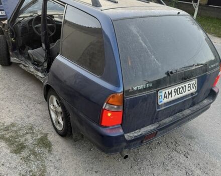 Синий Мицубиси Лансер, объемом двигателя 1.6 л и пробегом 999 тыс. км за 594 $, фото 13 на Automoto.ua