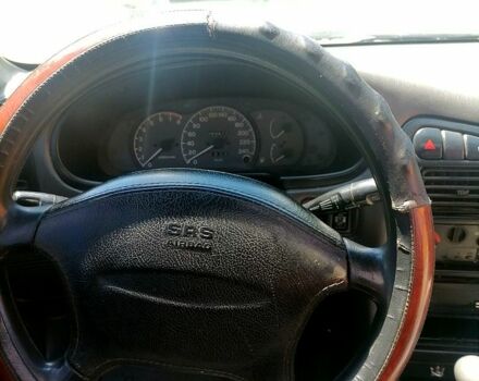 Синий Мицубиси Лансер, объемом двигателя 1.6 л и пробегом 225 тыс. км за 1100 $, фото 5 на Automoto.ua