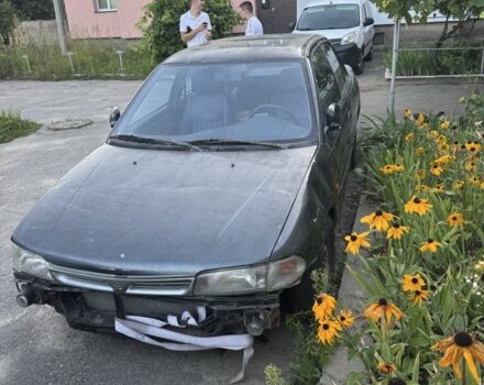 Синий Мицубиси Лансер, объемом двигателя 1.6 л и пробегом 999 тыс. км за 594 $, фото 1 на Automoto.ua