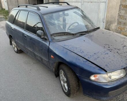 Синий Мицубиси Лансер, объемом двигателя 1.6 л и пробегом 999 тыс. км за 594 $, фото 10 на Automoto.ua