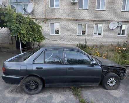 Синий Мицубиси Лансер, объемом двигателя 1.6 л и пробегом 999 тыс. км за 594 $, фото 3 на Automoto.ua