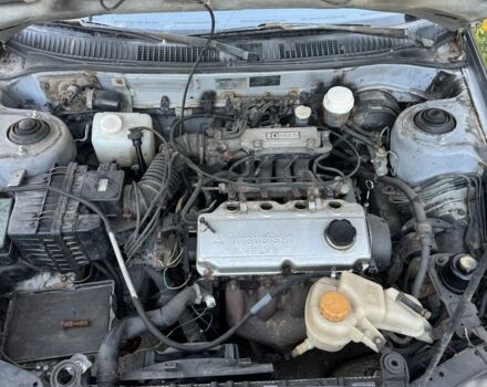 Синий Мицубиси Лансер, объемом двигателя 1.6 л и пробегом 999 тыс. км за 594 $, фото 7 на Automoto.ua