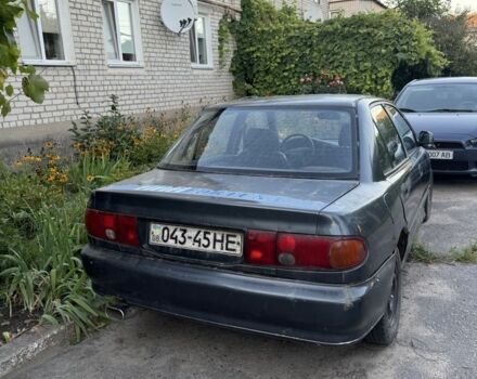 Синий Мицубиси Лансер, объемом двигателя 1.6 л и пробегом 999 тыс. км за 594 $, фото 4 на Automoto.ua