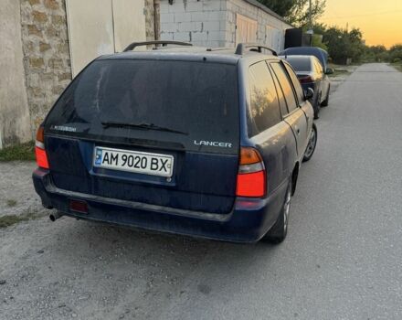 Синий Мицубиси Лансер, объемом двигателя 1.6 л и пробегом 999 тыс. км за 594 $, фото 12 на Automoto.ua