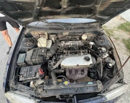 Синий Мицубиси Лансер, объемом двигателя 1.6 л и пробегом 999 тыс. км за 594 $, фото 19 на Automoto.ua