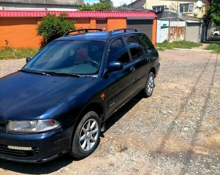 Синий Мицубиси Лансер, объемом двигателя 1.6 л и пробегом 225 тыс. км за 1100 $, фото 2 на Automoto.ua