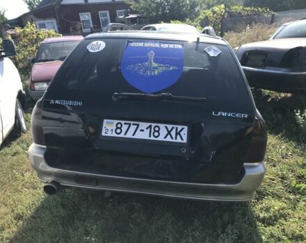 Синий Мицубиси Лансер, объемом двигателя 1.6 л и пробегом 555 тыс. км за 300 $, фото 5 на Automoto.ua