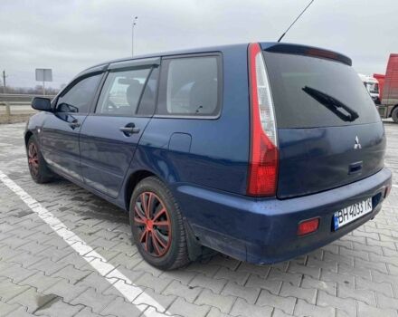 Синий Мицубиси Лансер, объемом двигателя 1.6 л и пробегом 240 тыс. км за 2600 $, фото 3 на Automoto.ua