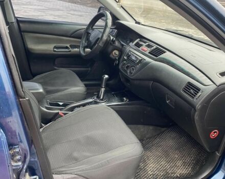 Синий Мицубиси Лансер, объемом двигателя 1.6 л и пробегом 240 тыс. км за 2600 $, фото 4 на Automoto.ua