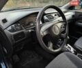 Синій Міцубісі Lancer, об'ємом двигуна 1.58 л та пробігом 199 тис. км за 3999 $, фото 17 на Automoto.ua