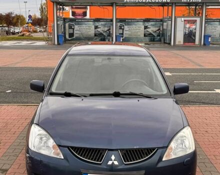 Синій Міцубісі Lancer, об'ємом двигуна 1.6 л та пробігом 220 тис. км за 2399 $, фото 5 на Automoto.ua