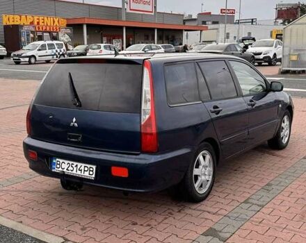 Синій Міцубісі Lancer, об'ємом двигуна 1.58 л та пробігом 220 тис. км за 2699 $, фото 2 на Automoto.ua