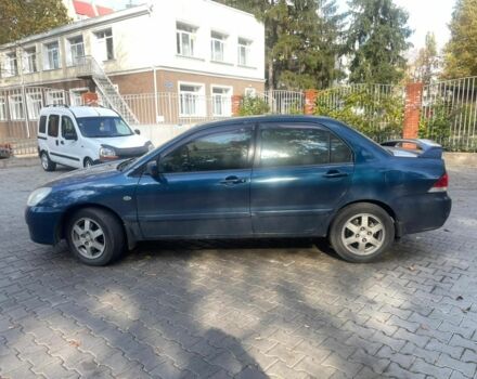 Мицубиси Лансер 2005 в Снигиревке на Automoto.ua Синий Мицубиси Лансер, объемом двигателя 2 л и пробегом 237 тыс. км за 3650 $, фото 2 на Automoto.ua