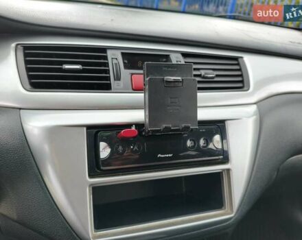 Мицубиси Лансер 2006 в Ковель на Automoto.ua Синий Мицубиси Лансер, объемом двигателя 1.6 л и пробегом 258 тыс. км за 3900 $, фото 17 на Automoto.ua