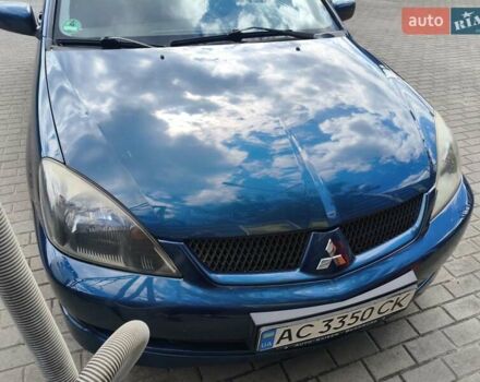Синій Міцубісі Lancer, об'ємом двигуна 1.6 л та пробігом 258 тис. км за 3000 $, фото 7 на Automoto.ua