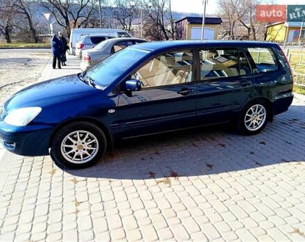 Мицубиси Лансер 2006 в Могилев-Подольском на Automoto.ua Синий Мицубиси Лансер, объемом двигателя 1.6 л и пробегом 221 тыс. км за 4700 $, фото 16 на Automoto.ua