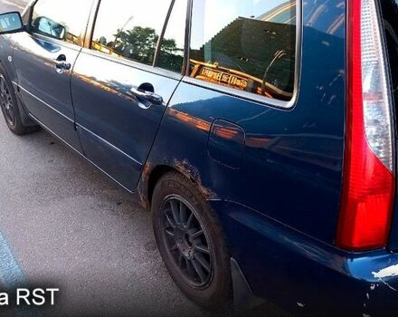 Синій Міцубісі Lancer, об'ємом двигуна 1.6 л та пробігом 245 тис. км за 3299 $, фото 5 на Automoto.ua