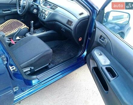 Мицубиси Лансер 2006 в Могилев-Подольском на Automoto.ua Синий Мицубиси Лансер, объемом двигателя 1.6 л и пробегом 221 тыс. км за 4700 $, фото 28 на Automoto.ua