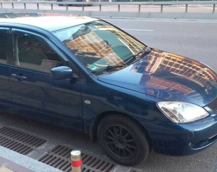 Синій Міцубісі Lancer, об'ємом двигуна 1.6 л та пробігом 245 тис. км за 3299 $, фото 1 на Automoto.ua