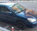 Синій Міцубісі Lancer, об'ємом двигуна 1.6 л та пробігом 245 тис. км за 3299 $, фото 1 на Automoto.ua