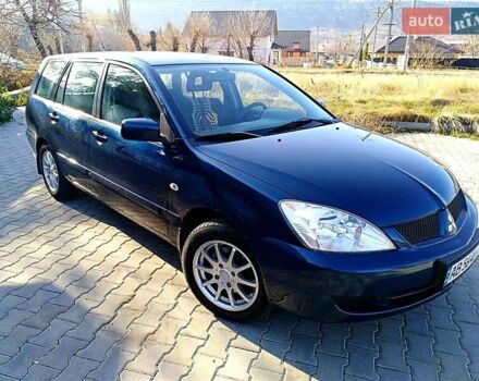 Мицубиси Лансер 2006 в Могилев-Подольском на Automoto.ua Синий Мицубиси Лансер, объемом двигателя 1.6 л и пробегом 221 тыс. км за 4700 $, фото 18 на Automoto.ua