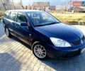 Мицубиси Лансер 2006 в Могилев-Подольском на Automoto.ua Синий Мицубиси Лансер, объемом двигателя 1.6 л и пробегом 221 тыс. км за 4700 $, фото 18 на Automoto.ua