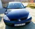 Мицубиси Лансер 2006 в Могилев-Подольском на Automoto.ua Синий Мицубиси Лансер, объемом двигателя 1.6 л и пробегом 221 тыс. км за 4700 $, фото 21 на Automoto.ua