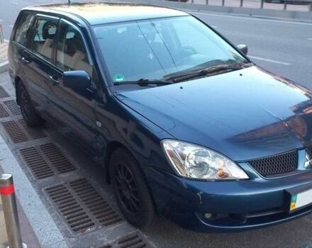 Синій Міцубісі Lancer, об'ємом двигуна 1.6 л та пробігом 245 тис. км за 3299 $, фото 2 на Automoto.ua