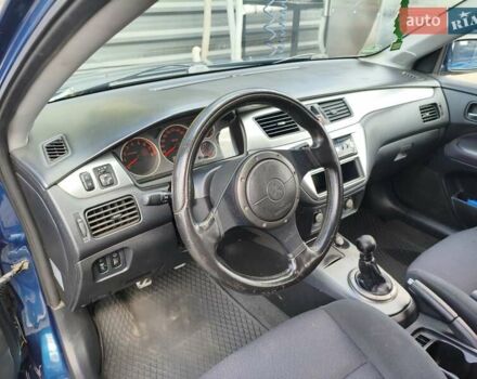 Мицубиси Лансер 2006 в Ковель на Automoto.ua Синий Мицубиси Лансер, объемом двигателя 1.6 л и пробегом 258 тыс. км за 3900 $, фото 11 на Automoto.ua