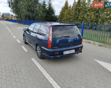 Синий Мицубиси Лансер, объемом двигателя 1.6 л и пробегом 258 тыс. км за 4300 $, фото 4 на Automoto.ua